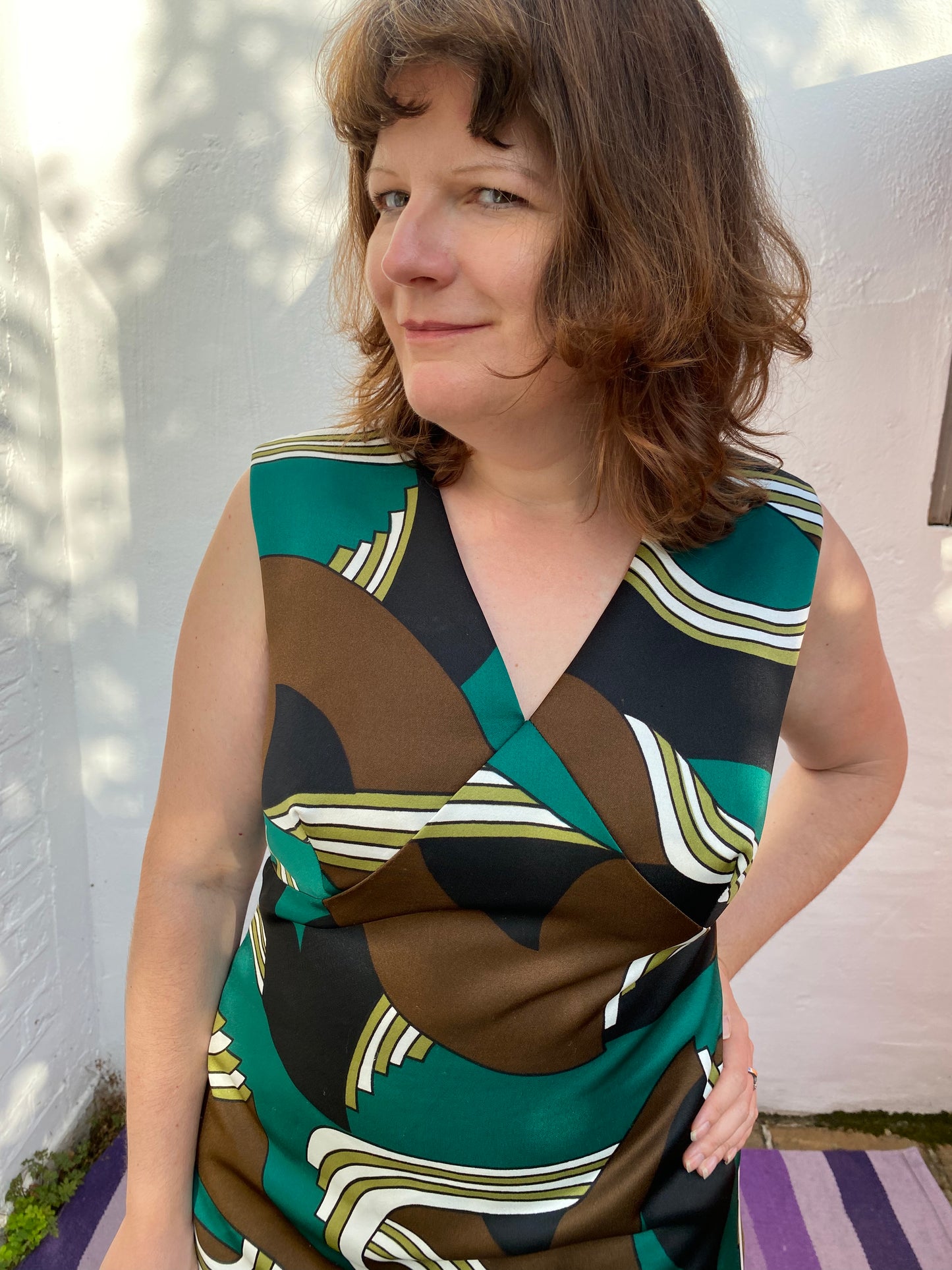 Vintage 70s green white brown print sleeveless polyester maxi dress with v neck and print front size 16 Grahl Modell label