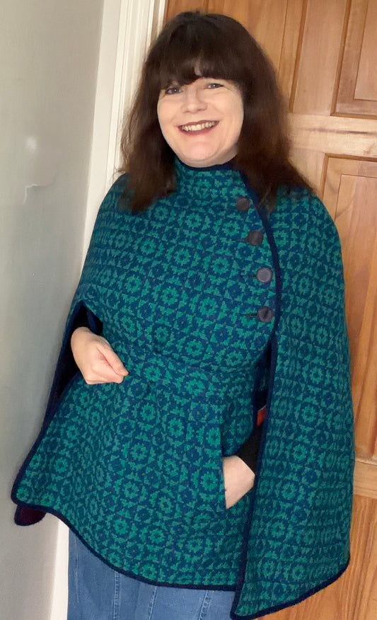 Vintage Welsh Wool Tapestry cape geometric print green blue belt side buttons pockets up to size 14. 40 inch bust