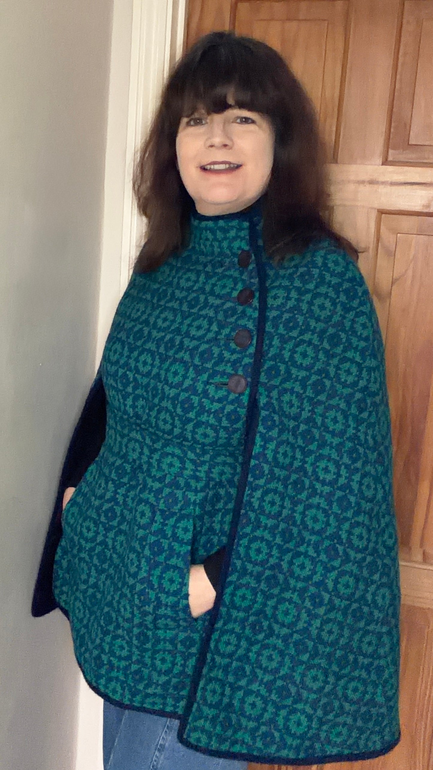 Vintage Welsh Wool Tapestry cape geometric print green blue belt side buttons pockets up to size 14. 40 inch bust